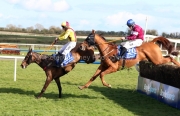5 April 2021;   Freewheelin Dylan, ridden by Ricky Doyle, leads Run Wild Fred, Jack Kennedy up, over the final obstacle before claiming The BoyleSports Irish Grand National Steeplechase at Fairyhouse.  © Peter Mooney, 59 Upper George's Street, Dun Laoghaire, Co. Dublin, A96 H2R3, Ireland  Tel: 00 353 (0)86 2589298