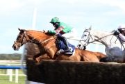 5 April 2021;   Ornua, Rachael Blackmore aboard, leads Annamix, Danny Mullins up, over a fence during the early stages of The Devenish Steeplechase at Fairyhouse.  © Peter Mooney, 59 Upper George's Street, Dun Laoghaire, Co. Dublin, A96 H2R3, Ireland  Tel: 00 353 (0)86 2589298