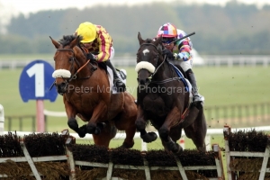 7 April 2019;  DISCORDANTLY, Robbie Power up, right, jumps the last flight with runner-up La Tektor, Denis O'Regan up, gaining victory in The Colm Quinn BMW Maiden Hurdle at Fairyhouse.      © Peter Mooney, 59 Upper George's Street, Dun Laoghaire, Co. Dublin, Ireland.    Tel:  00 353 (0)86 2589298