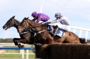 5 April 2021;   Easy Game, Brian Hayes up, leads Castlegrace Paddy, Bryan Cooper up, over the final obstacle before claiming The Devenish Steeplechase at Fairyhouse.  © Peter Mooney, 59 Upper George's Street, Dun Laoghaire, Co. Dublin, A96 H2R3, Ireland  Tel: 00 353 (0)86 2589298