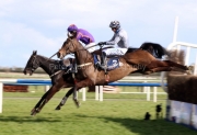 5 April 2021;   Easy Game, Brian Hayes up, leads Castlegrace Paddy, Bryan Cooper up, over the final obstacle before claiming The Devenish Steeplechase at Fairyhouse.  © Peter Mooney, 59 Upper George's Street, Dun Laoghaire, Co. Dublin, A96 H2R3, Ireland  Tel: 00 353 (0)86 2589298