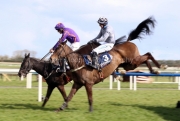 5 April 2021;   Easy Game, Brian Hayes up, leads Castlegrace Paddy, Bryan Cooper up, over the final obstacle before claiming The Devenish Steeplechase at Fairyhouse.  © Peter Mooney, 59 Upper George's Street, Dun Laoghaire, Co. Dublin, A96 H2R3, Ireland  Tel: 00 353 (0)86 2589298