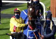 5 April 2021;  Ricky Doyle and Molly O'Connor celebrate the success of Freewheelin Dylan, ridden by Ricky Doyle, leads Run Wild Fred, Jack Kennedy up, over the final obstacle before claiming in The BoyleSports Irish Grand National Steeplechase at Fairyhouse.  © Peter Mooney, 59 Upper George's Street, Dun Laoghaire, Co. Dublin, A96 H2R3, Ireland  Tel: 00 353 (0)86 2589298