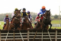 23 February 2019;   CHAVI ARTIST, David Mullins up, right, jumps the first flight ahead of runner-up, Tens Or better, Paul Townend up, left, before winning The Connolly's Red Mills Irish European Breeders Fund Auction Maiden Hurdle at Fairyhouse.      © Peter Mooney 59 Upper George's Street, Dun Laoghaire, Co. Dublin, A96 H2R3, Ireland.    Tel:  00 353 (0)86 2589298