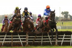 23 February 2019;   CHAVI ARTIST, David Mullins up, right, jumps the first flight ahead of runner-up, Tens Or better, Paul Townend up, left, before winning The Connolly's Red Mills Irish European Breeders Fund Auction Maiden Hurdle at Fairyhouse.      © Peter Mooney 59 Upper George's Street, Dun Laoghaire, Co. Dublin, A96 H2R3, Ireland.    Tel:  00 353 (0)86 2589298