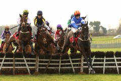 23 February 2019;   CHAVI ARTIST, David Mullins up, right, jumps the first flight ahead of runner-up, Tens Or better, Paul Townend up, left, before winning The Connolly's Red Mills Irish European Breeders Fund Auction Maiden Hurdle at Fairyhouse.      © Peter Mooney 59 Upper George's Street, Dun Laoghaire, Co. Dublin, A96 H2R3, Ireland.    Tel:  00 353 (0)86 2589298