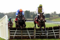 23 February 2019;   CHAVI ARTIST, David Mullins up, left, jumps the final flight alongside runner-up, Tens Or better, Paul Townend up, before winning The Connolly's Red Mills Irish European Breeders Fund Auction Maiden Hurdle at Fairyhouse.      © Peter Mooney 59 Upper George's Street, Dun Laoghaire, Co. Dublin, A96 H2R3, Ireland.    Tel:  00 353 (0)86 2589298