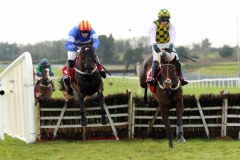 23 February 2019;   CHAVI ARTIST, David Mullins up, left, jumps the final flight alongside runner-up, Tens Or better, Paul Townend up, before winning The Connolly's Red Mills Irish European Breeders Fund Auction Maiden Hurdle at Fairyhouse.      © Peter Mooney 59 Upper George's Street, Dun Laoghaire, Co. Dublin, A96 H2R3, Ireland.    Tel:  00 353 (0)86 2589298