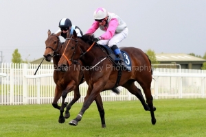 16 May 2021;   Hermana Estrella, ridden by Chris Hayes, defeating Quick Suzy, Gary Carroll up, in The Coolmore Stud Irish Stallion Farms European Breeders Fund Fillies Sprint Stakes at Naas.© Peter Mooney, 59 Upper George's Street, Dun Laoghaire, Co. Dublin, A96 H2R3, Ireland  Tel: 00 353 (0)86 2589298