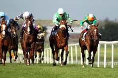 24 March 2019;  NORMANDEL, Kevin Manning up, right, holds the challenges of Hand On Heart, Wayne Lordan up, left, and Yulong Gold Fairy, Shane Foley up, to win The Lodge Park Stud Irish European Breeders Fund Park Express Stakes at Naas.      © Peter Mooney, 59 Upper George's Street, Dun Laoghaire, Co. Dublin, Ireland.    Tel:  00 353 (0)86 2589298