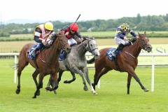19 July 2019;  SERVALAN, Shane Foley up, check cap, shades the verdict from Woody Creek, Chris Hayes up, nearside, and Gold Filigree, Shane Kelly up, grey, in The Yeomanstown Stud Irish European Breeders Fund Stakes at Naas.      © Peter Mooney, 59 Upper George's Street, Dun Laoghaire, Co. Dublin, Ireland.    Tel:  00 353 (0)86 2589298
