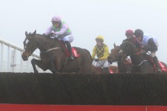 6 December 2020;  Min, Patrick Mullins aboard, takes an obstacle on his way to winning The John Durkan Memorial Punchestown Steeplechase at Punchestown. © Peter Mooney, 59 Upper George's Street, Dun Laoghaire, Co. Dublin, A96 H2R3, Ireland  Tel: 00 353 (0)86 2589298