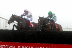 6 December 2020;  Min, Patrick Mullins aboard, takes the final obstacle ahead of stable companion, Tornado Flyer, Bryan Cooper up, before winning The John Durkan Memorial Punchestown Steeplechase at Punchestown. © Peter Mooney, 59 Upper George's Street, Dun Laoghaire, Co. Dublin, A96 H2R3, Ireland  Tel: 00 353 (0)86 2589298