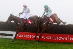 6 December 2020;  Min, Patrick Mullins aboard, takes the final obstacle ahead of stable companion, Tornado Flyer, Bryan Cooper up, before winning The John Durkan Memorial Punchestown Steeplechase at Punchestown. © Peter Mooney, 59 Upper George's Street, Dun Laoghaire, Co. Dublin, A96 H2R3, Ireland  Tel: 00 353 (0)86 2589298