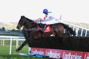 28 April 2021;   Clan Des Obeaux and Sam Twiston-Davies leap the final obstacle before claiming The Ladbrokes Punchestown Gold Cup at Punchestown.© Peter Mooney, 59 Upper George's Street, Dun Laoghaire, Co. Dublin, A96 H2R3, Ireland  Tel: 00 353 (0)86 2589298