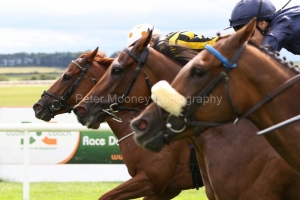 6 August 2018;  TOUGH SPIRIT, Shane Foley up, spotted cap, defeating Julienne, Donnacha O'Brien up, centre, and Intermedia, Colm O'Donoghue up, in The Curragh "Where Champions Are Made" Fillies Maiden at The Curragh.      © Peter Mooney, 59 Upper George's Street, Dun Laoghaire, Co. Dublin, Ireland.    Tel:  00 353 (0)86 2589298